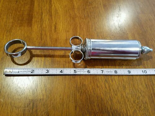 Antique pain Surgical steel syringe 2 ounce