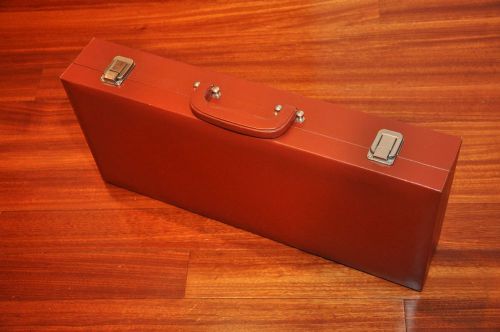 Brown Jewelry display suitcase with two black removable trays, interior velvet