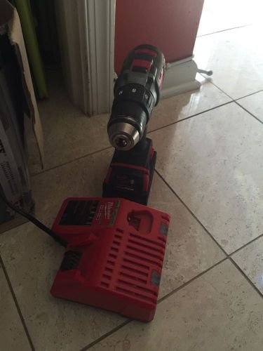 Milwaukee Package, Drill, Battery And Charger M18