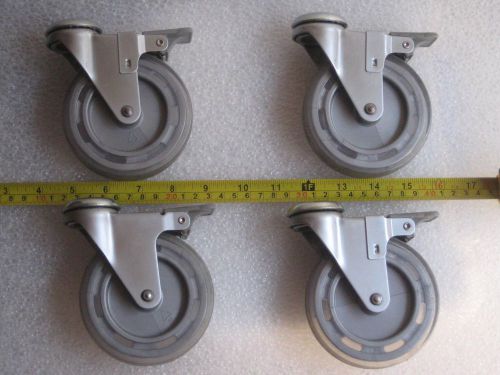 Set of Four F.W. 4 inch casters with brake