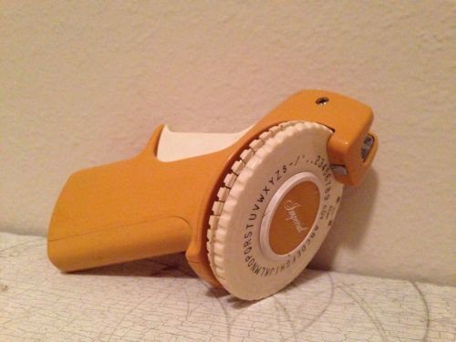 Imperial mustard yellow vintage turn style label maker
