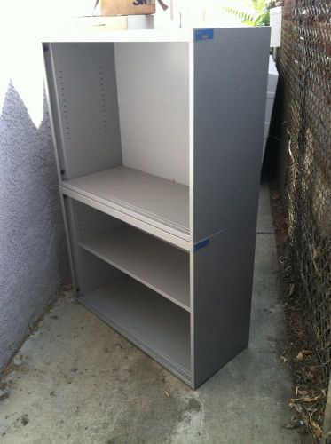 Pre-owned two open shelf metal cabinet scratches good condition 36x27x15 each for sale