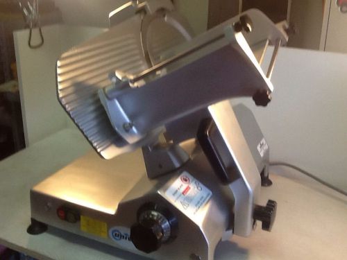 Univex 7512 value series 12in .5hp manual feed belt driven slicer for sale