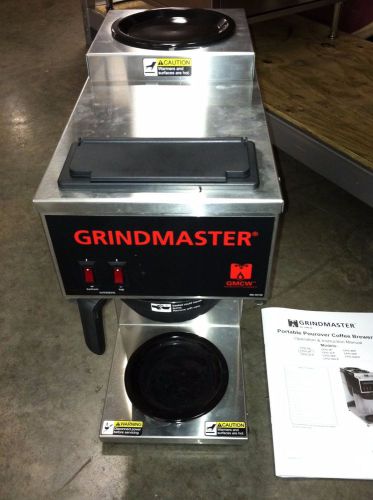 Grindmaster coffee brewer, pour in water, manual included, 2 warmers, 120v