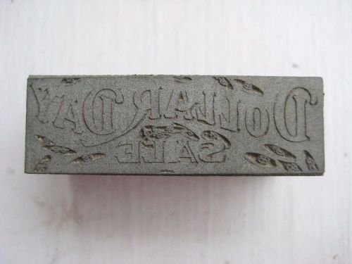 Vintage Letterpress Metal Cut &#034;Dollar Day Sale&#034; on Wood Block