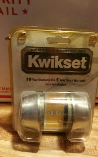 locksmith  double cylinder deadbolt kwikset.silver in color.