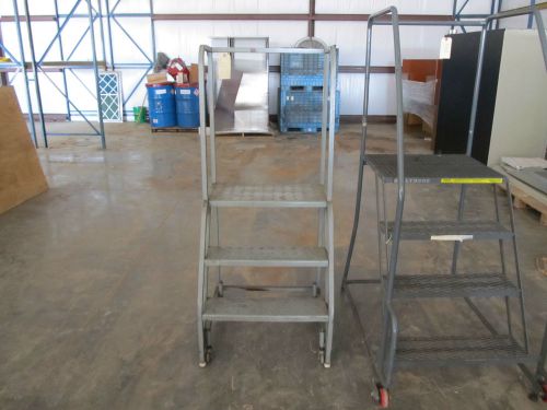 Various size welded fabricated step ladder some roll around some stationary