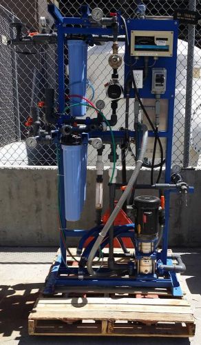 DI WATER SKID WITH PUMP, UV LIGHT, FILTERS AND CONNECTIONS FOR MIXED BEDS