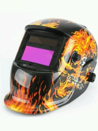 Welding helmet solar powered auto darkening  skull flame protection  new for sale