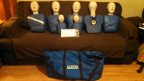 7-cpr manikins complete adult/infant by prompt with carrying case + aed trainer for sale