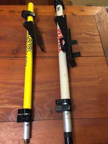 Lot of 2 laser pole rods pentax and laser technology with holders surveying for sale