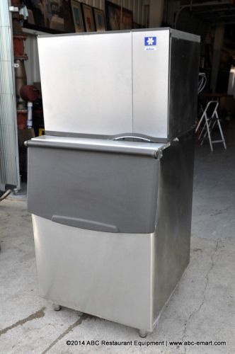 Manitowoc air cooled 560 lb. half size cube ice machine with bin restaurant for sale