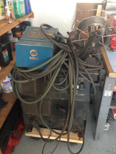 Miller cp302 mig welder welding source with wire feed for sale