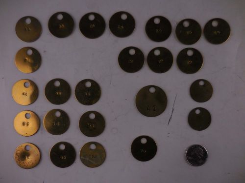 Quantity of 24 round brass key tags #6h7 for sale