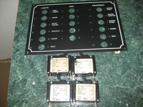 Lot of 4 circuit breakers and a breaker cover plate for sale