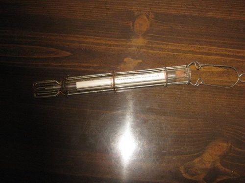 Antique thermometer in metal cage used for making poster glue or tempered paste for sale