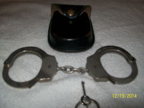VINTAGE HANDCUFFS,PEERLESS HANDCUFF CO PAT # 1531451-1872867 REPLACEMENT KEY