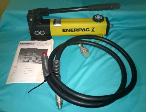 ENERPAC P-142 10,000 PSI HYDRAULIC HAND PUMP WITH HOSE PAPERWORK NEW