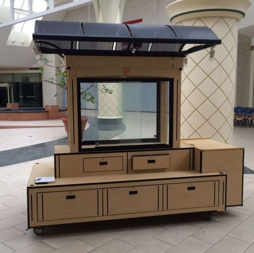 Mall kiosk used- excellent condition: features- illuminated/lighted display for sale