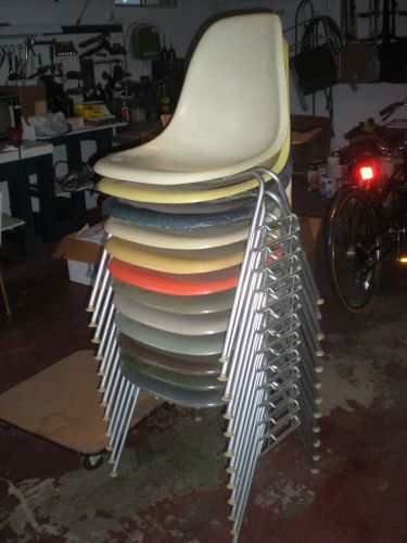 12 Fiberglass stackable banquet chairs with rolling rack