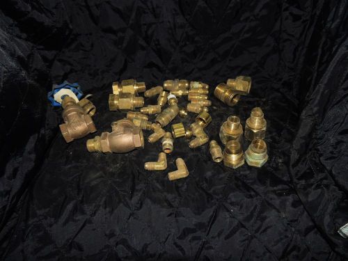 assorted 30 plus pieces of brass fittings and valves