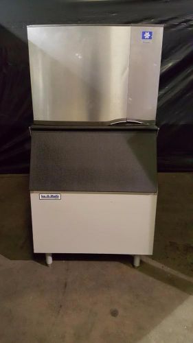 Manitowoc sy0454a 450 lb. air cooled 1/2 cube ice maker w/ storage bin for sale