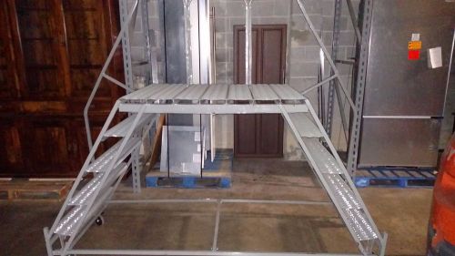 4 Step Rolling warehouse platform with dual steps 4 foot high