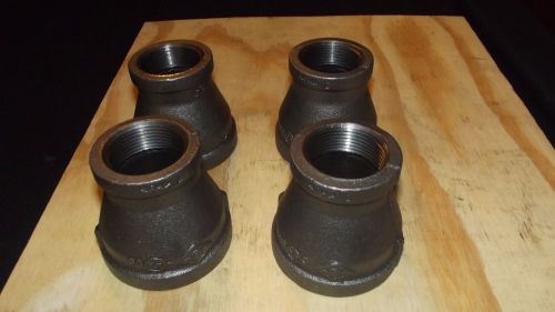 Lot of (4) 2 x 1 1/4  inch reducer coupling black  iron pipe threaded fittings for sale