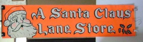 A Santa Clause Lane Store banner,13x56&#034;