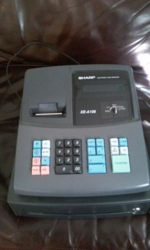 Sharp XE-A106 Cash Management Register and one box of matching paper