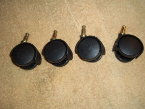 set of 4 swivel casters from entertainment center cart