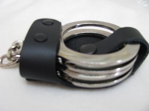 Bikini Handcuff Case byPerfect Fit. Black leather with black snap.Fits2.25&#034; belt