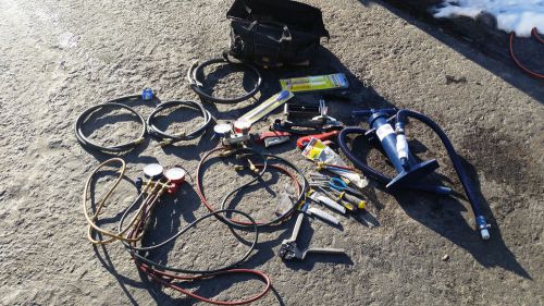 Lot of hvac tools with mighty pump, leak dye, hoses, manifold gauges and more for sale