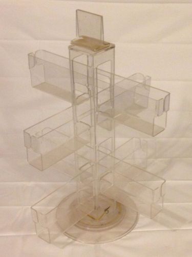 Clear plastic rotating display rack for small items