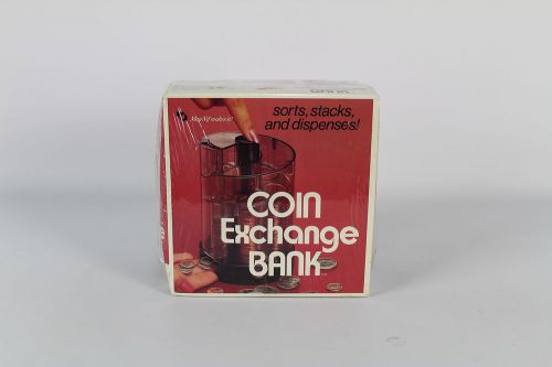 COIN EXCHANGE BANK SORTS STACKS AND DISPENSES