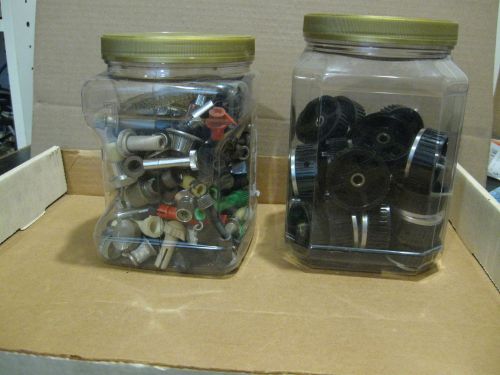 2 Containers Of Radio Knobs