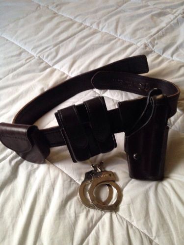 Vintage a e nelson officers belt with safariland holster, cuffs, magazines pouch for sale