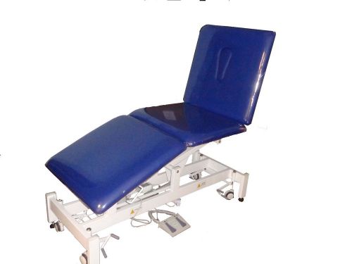 Treatment / Examination table with 3 movable sections by electric power