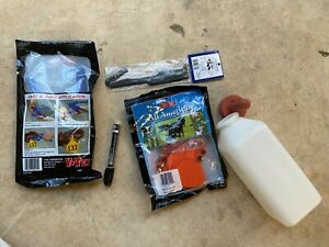 22 Y Tex orange tags, pen, application tool, remover and bottle