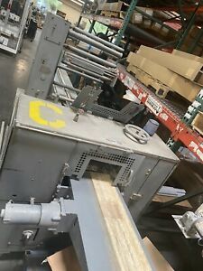horizontal flow wrapper. Doboy Mustang IV