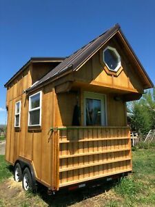 tiny House on wheels tiny house  live edge slab woodwork off grid