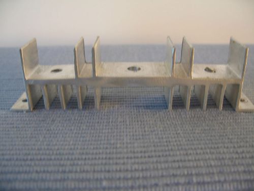 Heavy aluminum heat sink, 4 3/4&#034; x 3/4&#034;x 1 1/4&#034;,mounts three transistors, used for sale