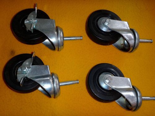 Pop in caster wheels-  set of 4 (2) with brakes-like new! for sale