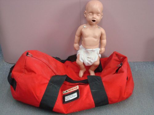 BABY TRAINING MANIKIN AND L.A. RESCUE CANVAS BAG.