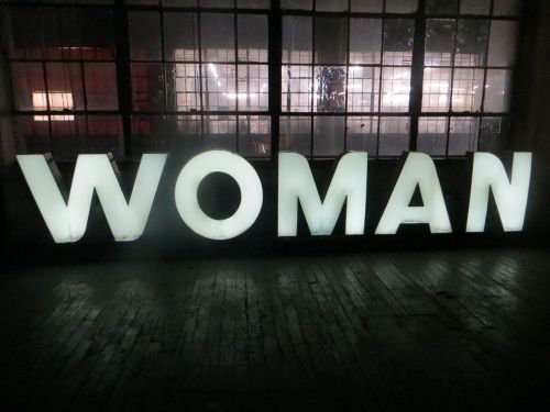 Vintage industrial large neon woman sign 15 1/2 feet long aluminum store display for sale