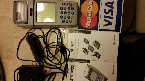 Nurit 8000 Portable Credit Card Machine with charger, paper rolls