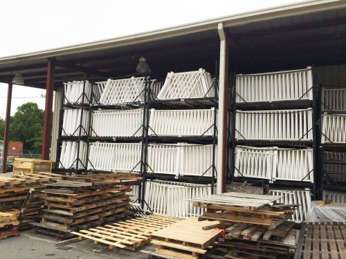 +- 6,000 linear &#039; PVC fencing. 8&#039; sections, 3 1/2&#039; tall w/custom racking