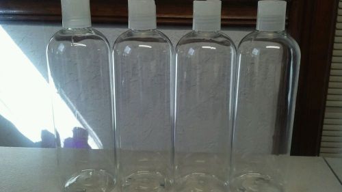 Lot (4)16 Oz Cosmo round clear Plastic bottles with disk top
