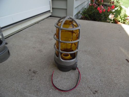 Vintage appleton  explosion-proof industrial light, cage amber glass globe for sale