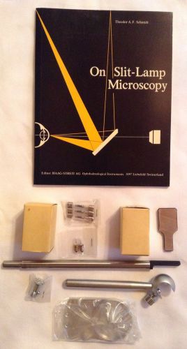 Lot slit-lamp accessories book fuses bulbs metal pieces schmidt on sl microscopy for sale